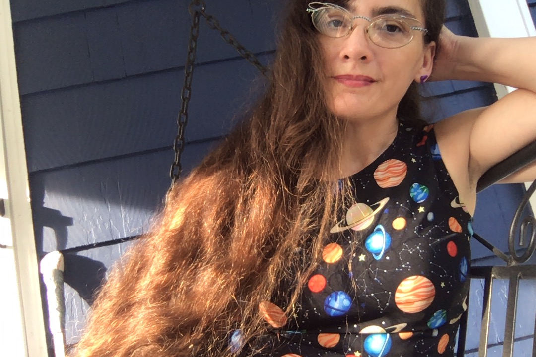 Marie suns herself in her space dress.
