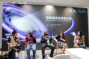 Four figures in chairs with mics in front of a wall painted with space scene and Chengdu World Science Fiction Convention: Meet the Future